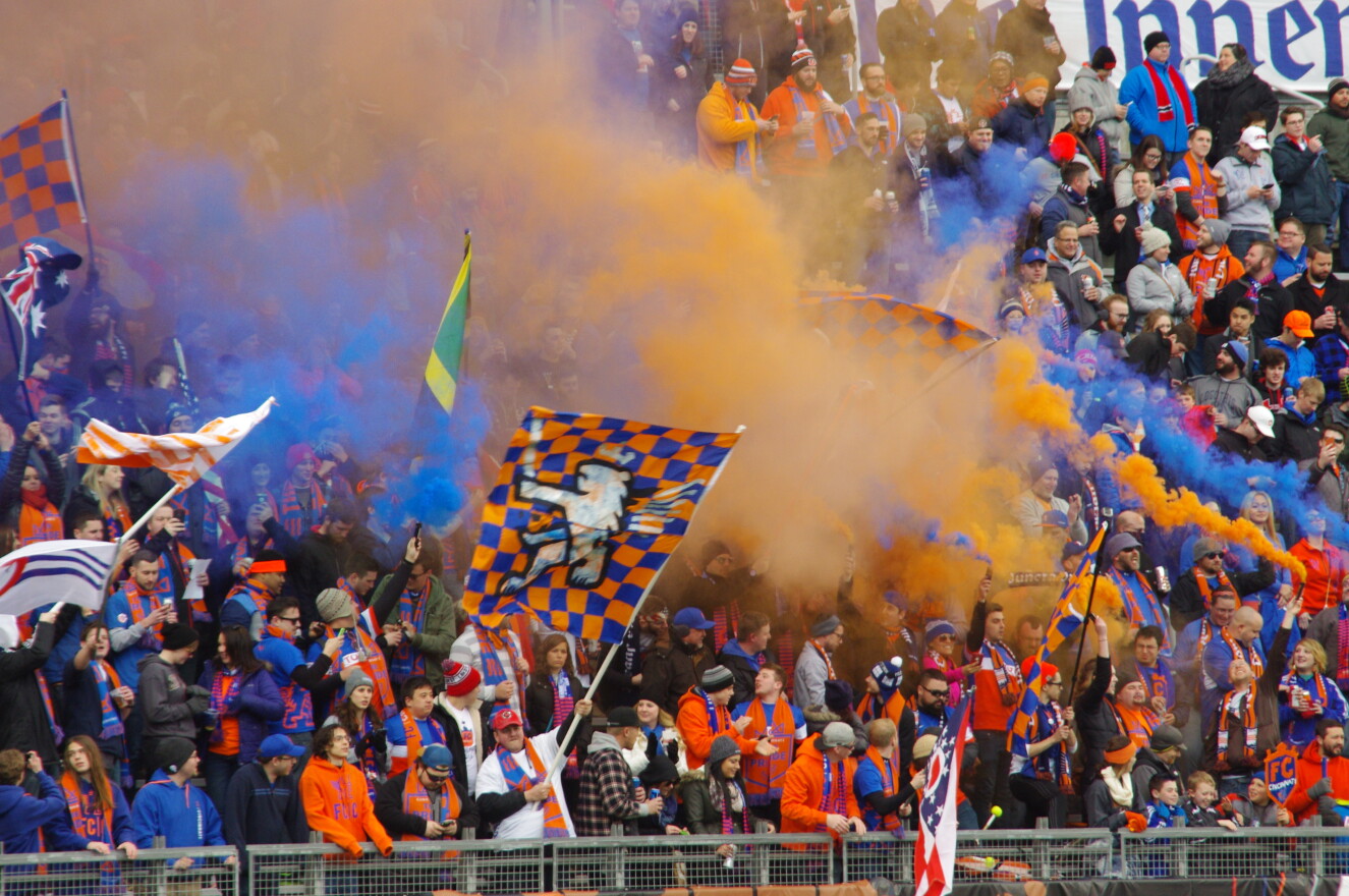 Fans in The Bailey celebrate during an FC Cincinnati match.